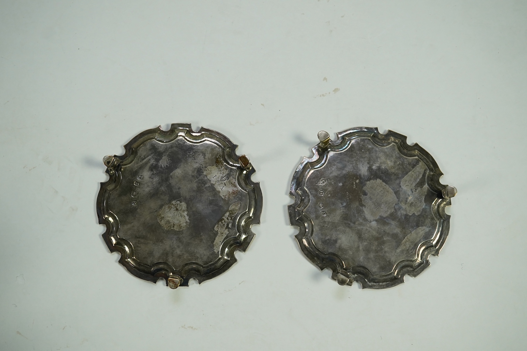 A pair of George II silver waiters, by John Swift